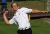 Luke Donald tosses his ball into the crowd after his match against Jim Furyk