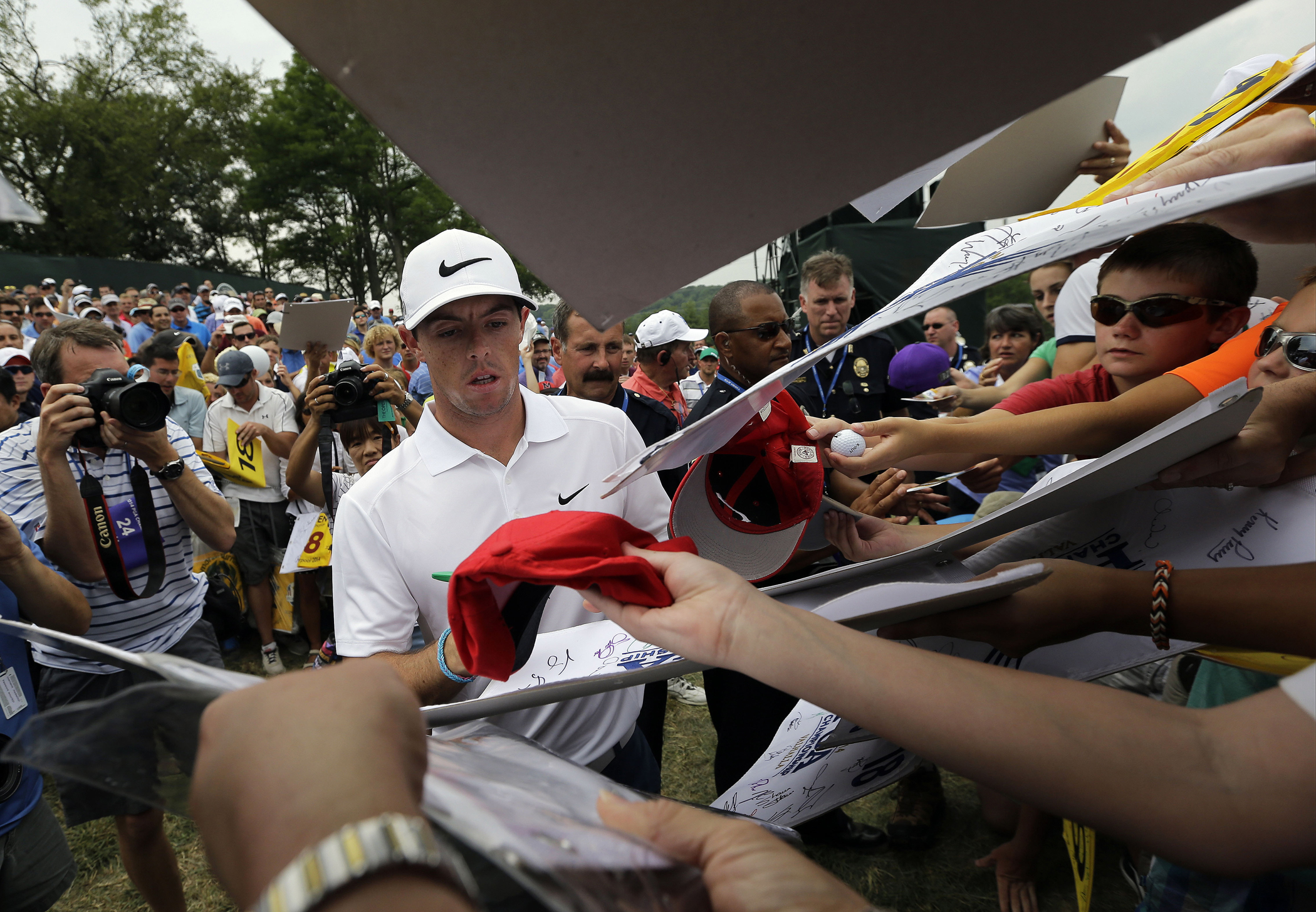 Fans interact with Rory McIlroy on Tuesday at Valhalla before the 2014 PGA Championship.