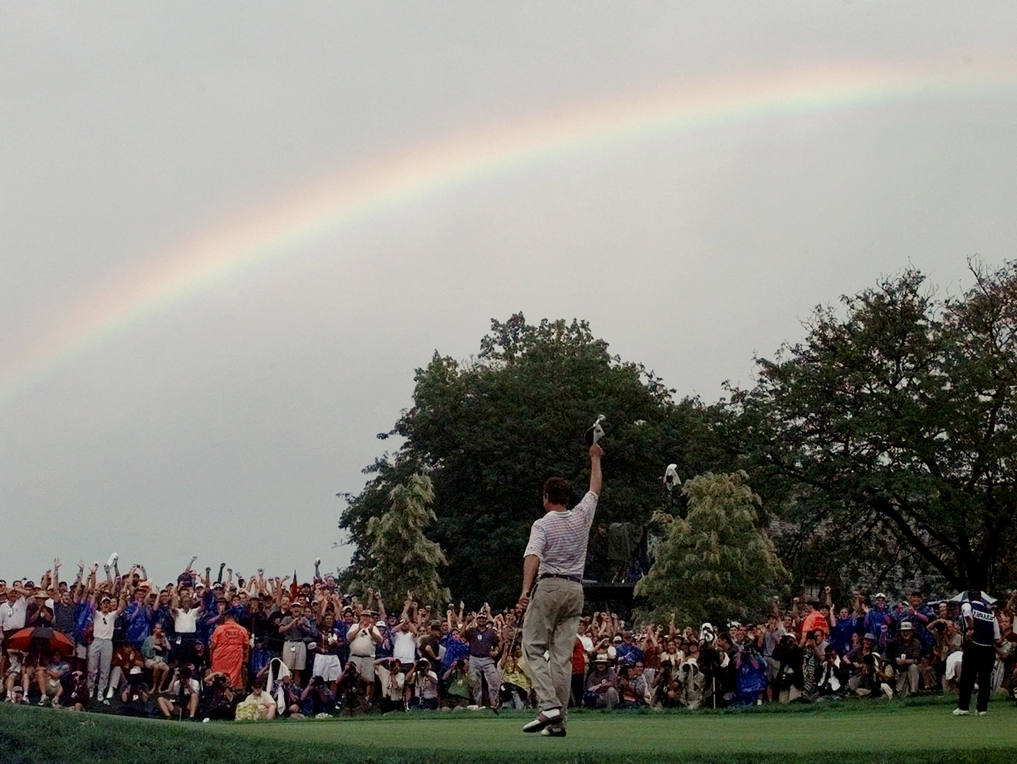 A rainbow soars above Davis Love III, of Sea Island, Ga., after he won the PGA Championship at Winged Foot Golf Club in Mamaroneck, N.Y., Sunday, August 17, 1997. Love finished the four rounds at -11.