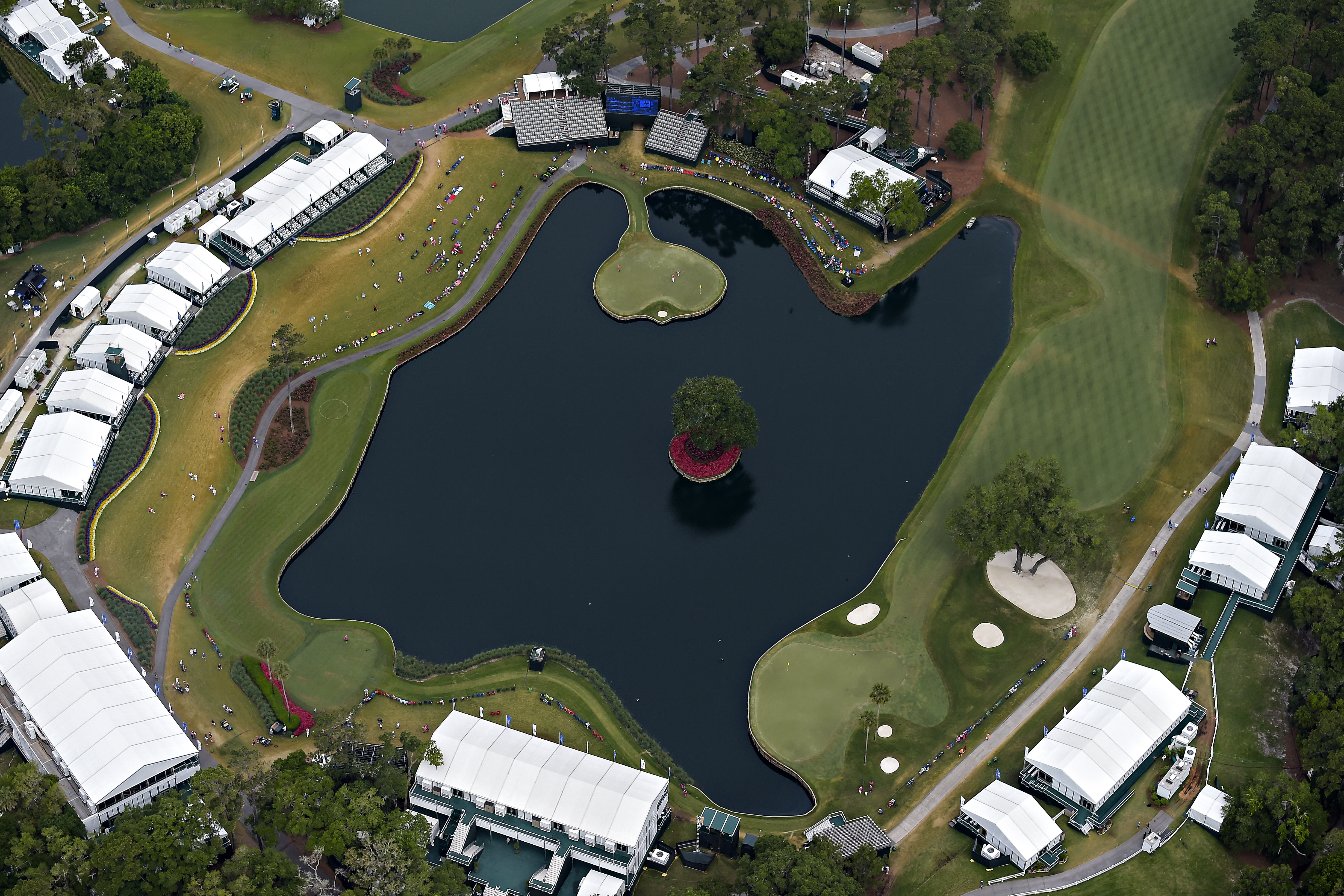 TPC Sawgrass' 17th-hole island green and its surroundings Sunday's final round of the PGA Tour's 2014 Players Championship at TPC Sawgrass in Ponte Vedra Beach, Fla.