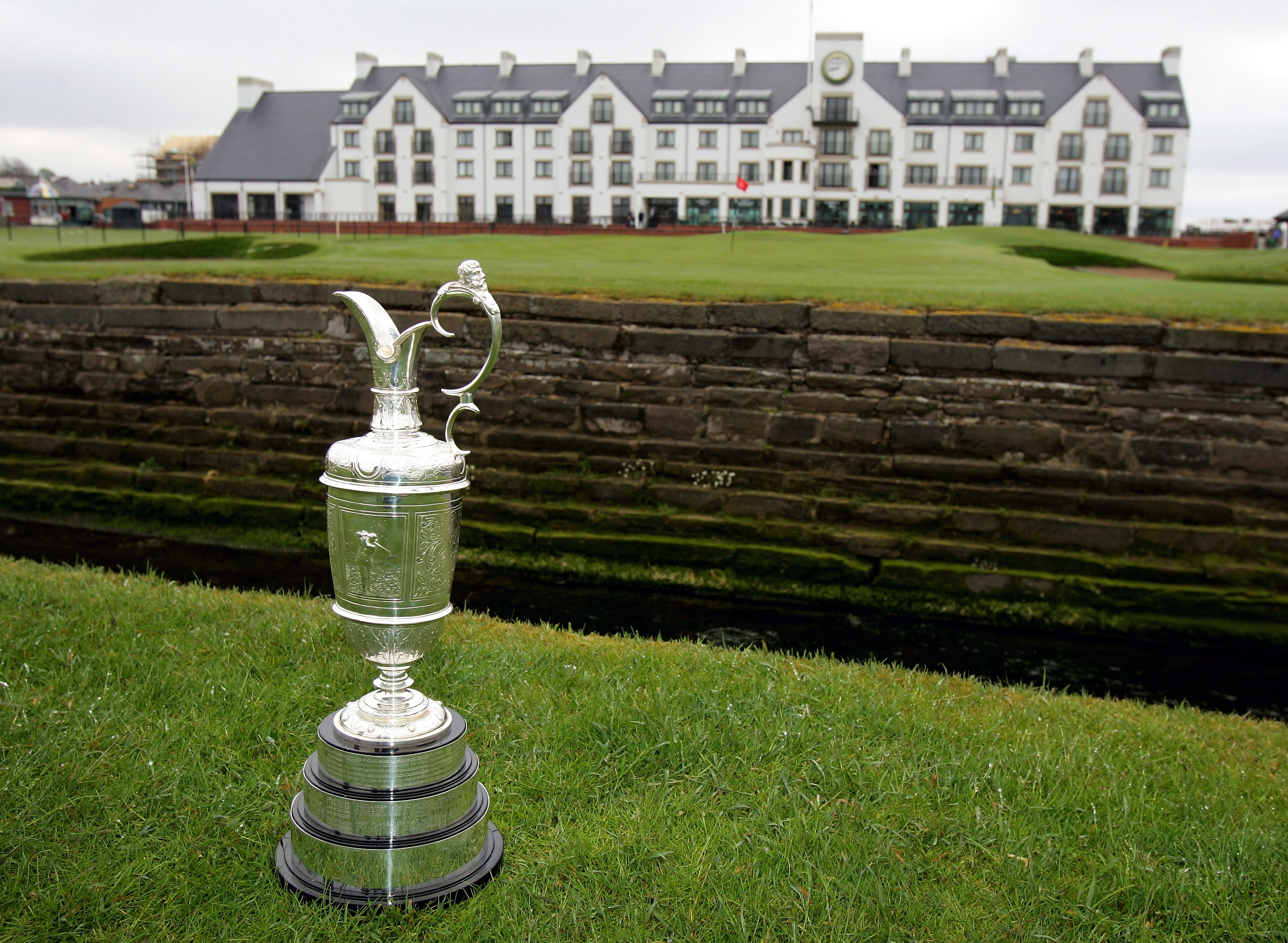 CARNOUSTIE, UNITED KINGDOM - MAY 01: A close-up of the claret jug trophy in front of the clubhouse prior to The Open Championship press conference held at Carnoustie Golf Club on May 1, 2007 in Carnoustie, Scotland. (Photo by Andrew Redington/Getty Images)