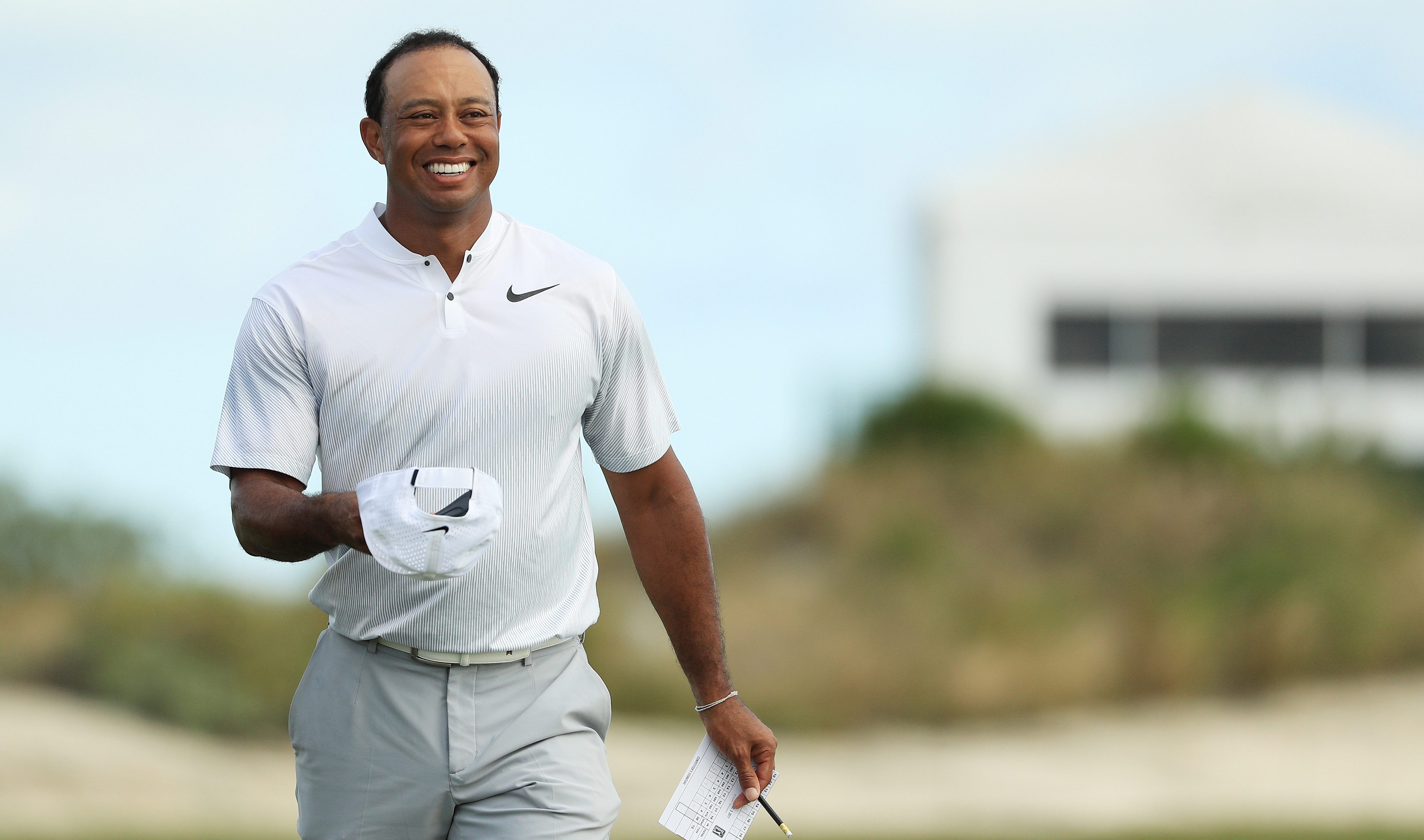 NASSAU, BAHAMAS - DECEMBER 01: Tiger Woods of the United States walks off of the 18th green after finishing the second round of the Hero World Challenge at Albany, Bahamas on December 1, 2017 in Nassau, Bahamas. (Photo by Mike Ehrmann/Getty Images)