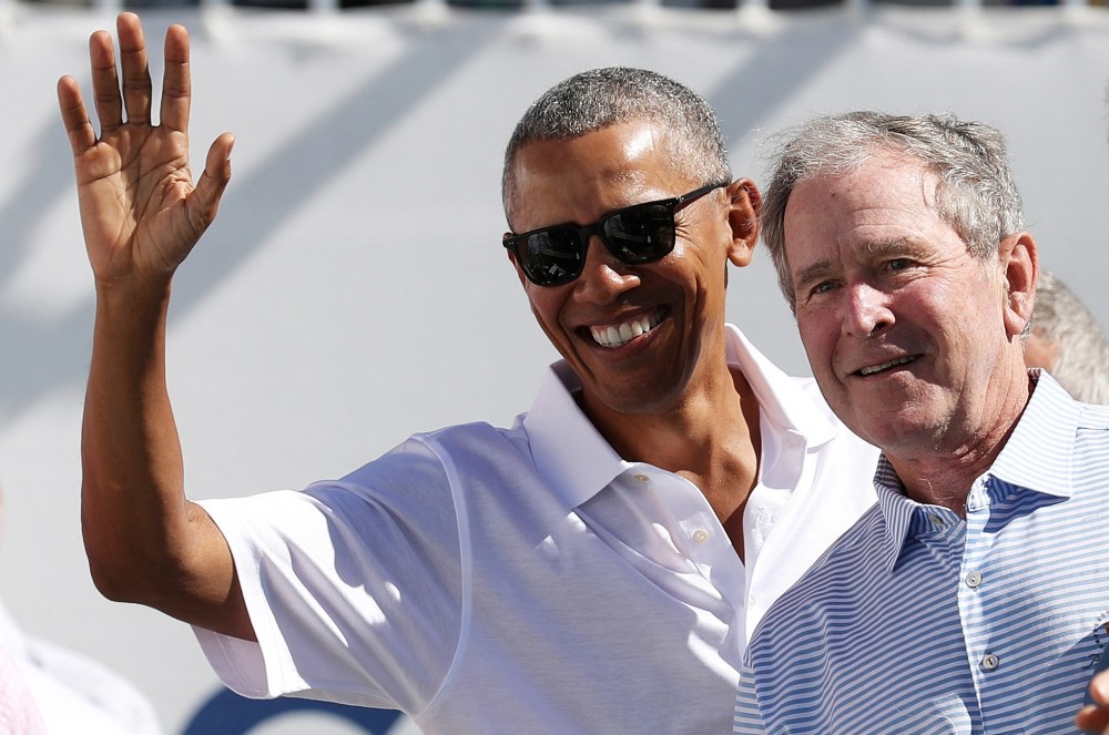JERSEY CITY, NJ - SEPTEMBER 28: (L-R) Former U.S. Presidents Barack Obama, George W. Bush and Bill Clinton attend the trophy presentation prior to Thursday foursome matches of the Presidents Cup at Liberty National Golf Club on September 28, 2017 in Jersey City, New Jersey. (Photo by Rob Carr/Getty Images)