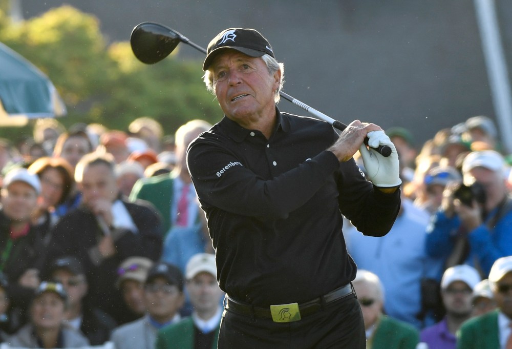 Apr 5, 2018; Augusta, GA, USA; Gary Player hits a ceremonial tee shot on the 1st hole during the first round of the Masters golf tournament at Augusta National GC. Mandatory Credit: Michael Madrid-USA TODAY Sports