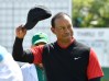 Apr 8, 2018; Augusta, GA, USA; Tiger Woods waves to the gallery after putting on the 18th green during the final round of the Masters golf tournament at Augusta National Golf Club. Mandatory Credit: Michael Madrid-USA TODAY Sports
