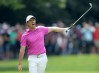 VIRGINIA WATER, ENGLAND - MAY 27: Rory McIlroy of Northern Ireland signals that his second shot has gone left towards the crowds on the par 5, 17th hole during the final round of the 2018 BMW PGA Championship on the West Course at Wentworth on May 27, 2018 in Virginia Water, England. (Photo by David Cannon/Getty Images)