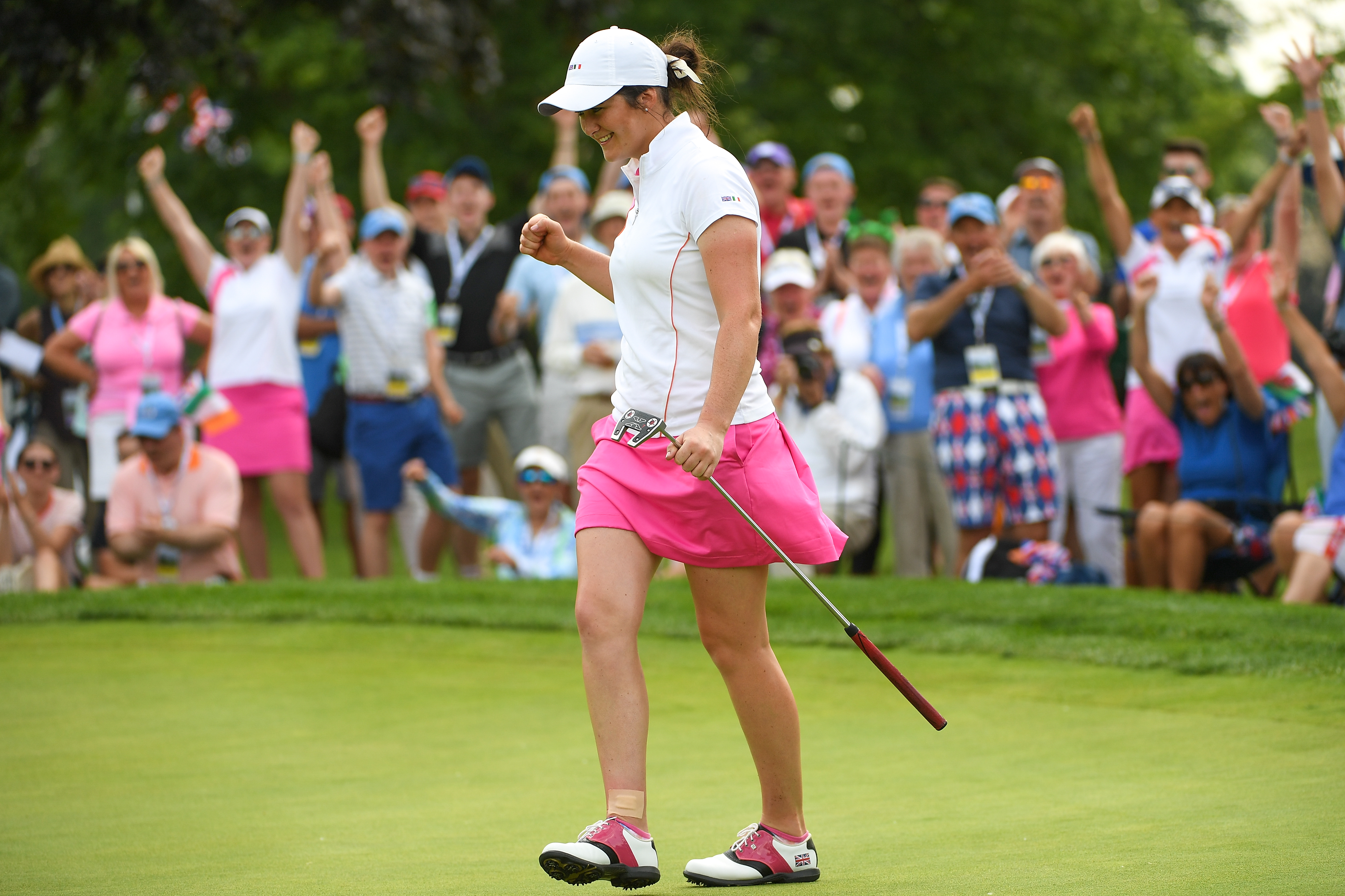 SCARSDALE, NY - JUNE 08: Paula Grant of Great Britian & Ireland celebrates after a birdie putt on the 18th green during four-ball matches on day one of the 2018 Curtis Cup at Quaker Ridge Golf Club on June 8, 2018 in Scarsdale, New York. (Photo by Ross Kinnaird/R&A/R&A via Getty Images)