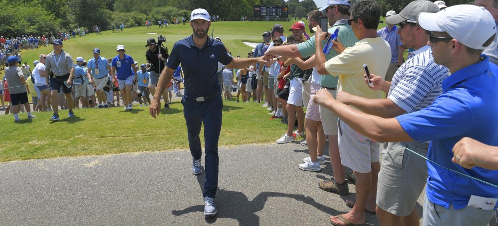 MEMPHIS, TN - JUNE 10: Dustin Johnson fist bumps fans along the ninth hole during the final round of the FedEx St. Jude Classic at TPC Southwind on June 10, 2018 in Memphis, Tennessee. (Photo by Stan Badz/PGA TOUR)