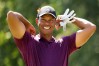 POTOMAC, MD - JUNE 29: Tiger Woods and Marc Leishman of Australia speak on the 18th green during the second round of the Quicken Loans National at TPC Potomac on June 29, 2018 in Potomac, Maryland. (Photo by Rob Carr/Getty Images)