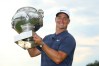 PARIS, FRANCE - JULY 01: Alex Noren of Sweden celebrates with the trophy after winning the HNA Open de France at Le Golf National on July 1, 2018 in Paris, France. (Photo by Warren Little/Getty Images)