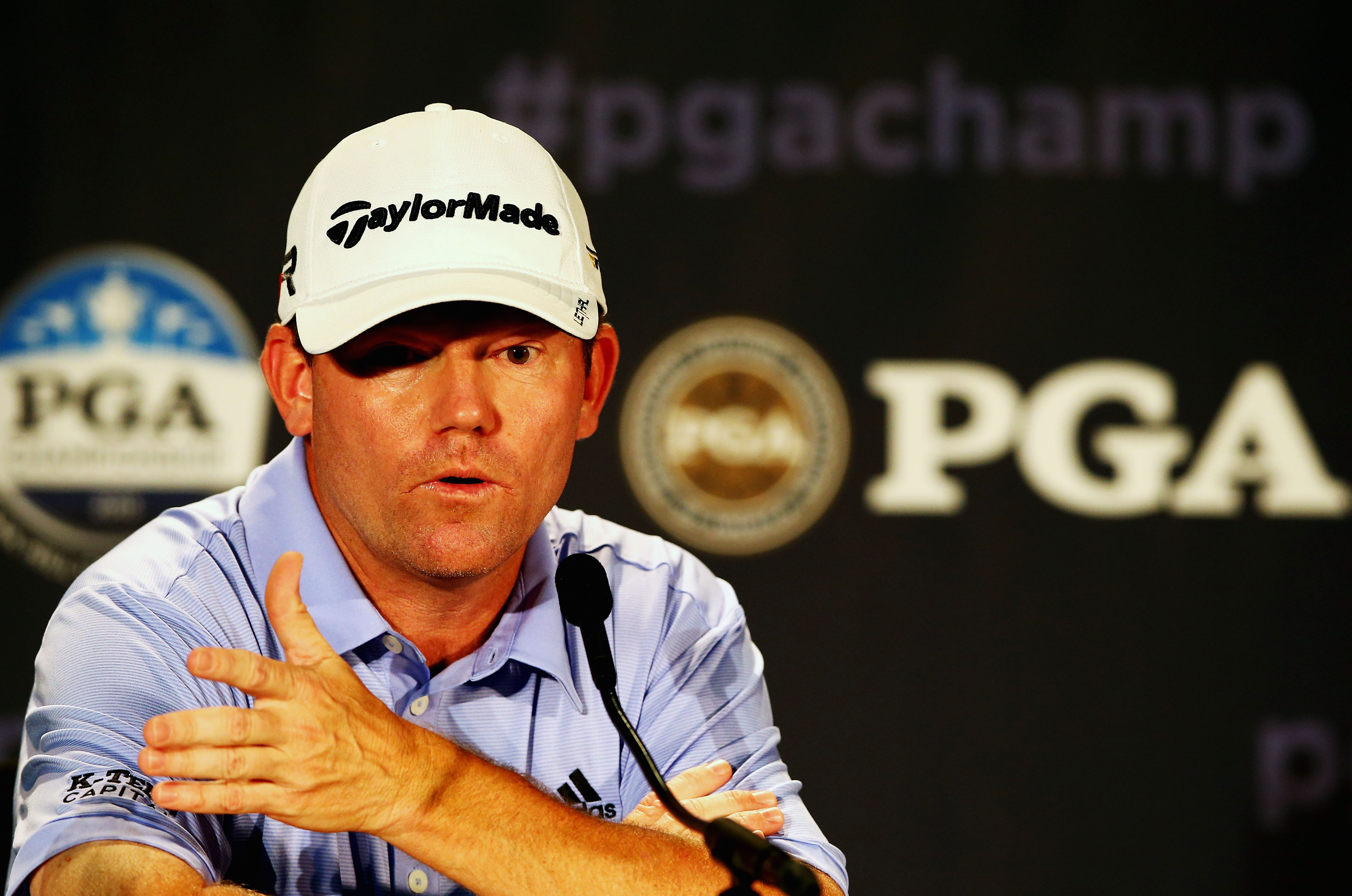 ROCHESTER, NY - AUGUST 06: Shaun Micheel of the United States is interviewed during a press conference prior to the start of the 95th PGA Championship at Oak Hill Country Club on August 6, 2013 in Rochester, New York. (Photo by Streeter Lecka/Getty Images)