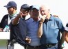 JERSEY CITY, NJ - SEPTEMBER 28: Captain's assistant Tiger Woods of the U.S. Team speaks to Former U.S. Presidents George W. Bush and Bill Clinton during Thursday foursome matches of the Presidents Cup at Liberty National Golf Club on September 28, 2017 in Jersey City, New Jersey. (Photo by Elsa/Getty Images)