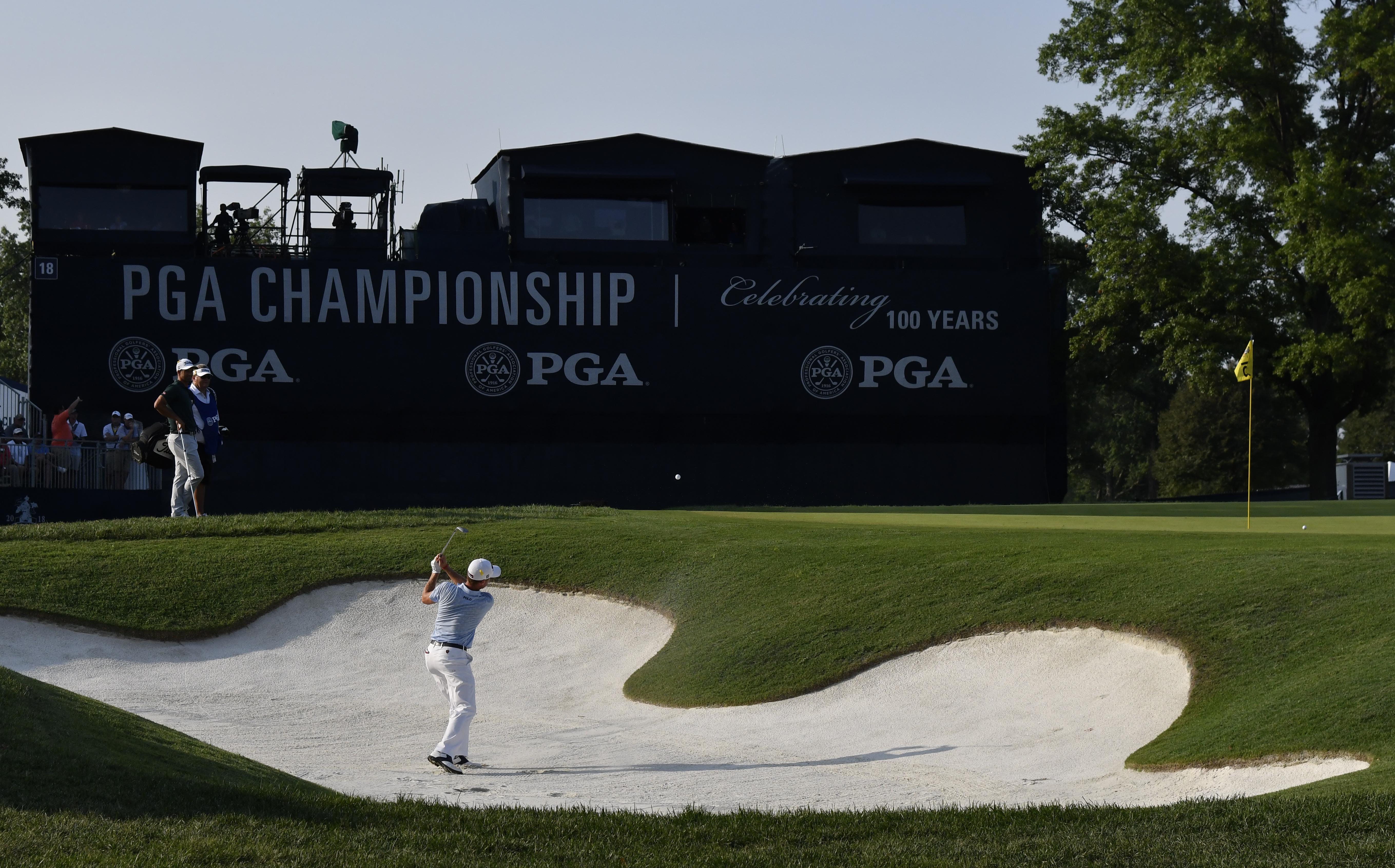 Aug 11, 2018; Saint Louis, MO, USA; Justin Thomas hits out of a bunker on the 18th hole during the third round of the PGA Championship golf tournament at Bellerive Country Club. Mandatory Credit: Jeff Curry-USA TODAY Sports