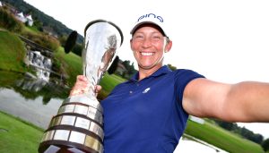 EVIAN-LES-BAINS, FRANCE - SEPTEMBER 16: Angela Stanford of the United States poses as if she was taking a selfie photograh with the Evian Championship Trophy after victory in the compeition during Day Four of The Evian Championship 2018 at Evian Resort Golf Club on September 16, 2018 in Evian-les-Bains, France. (Photo by Stuart Franklin/Getty Images)