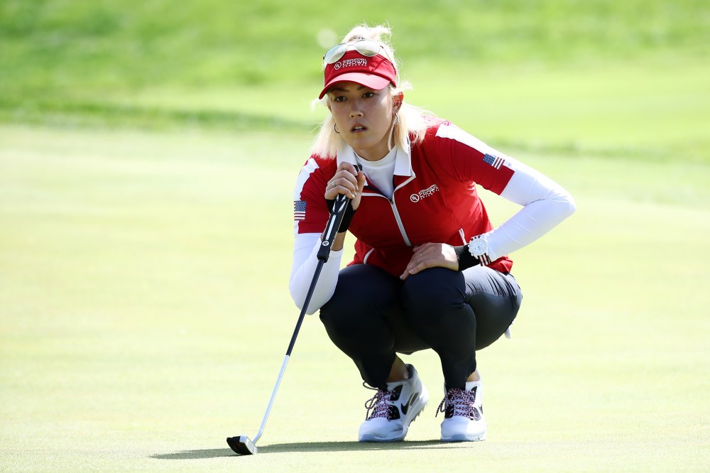 INCHEON, SOUTH KOREA - OCTOBER 07: Michelle Wie of the United States lines up for a putt on the 3rd green during the Singles match against Moriya Jutanugarn of Thailand on day four of the UL International Crown at Jack Nicklaus Golf Club on October 7, 2018 in Incheon, South Korea. (Photo by Chung Sung-Jun/Getty Images)
