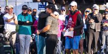 Jordan Spieth and Patrick Reed hug on the first tee during the third round of the Farmers Insurance Open on Torrey Pines South on Jan. 26.