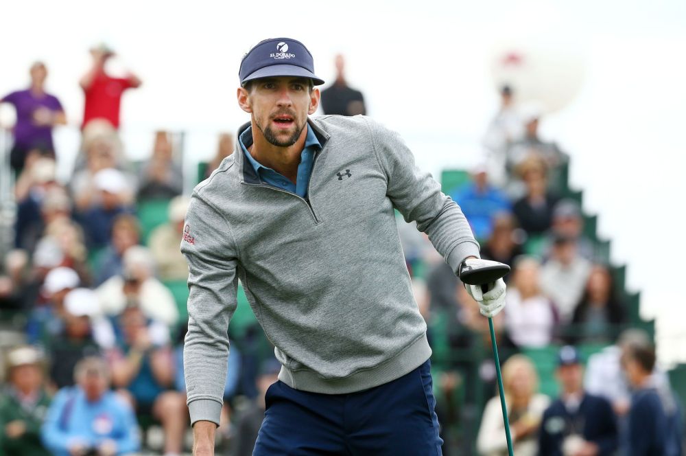 Michael Phelps leans into his swing on No. 1 at TPC Scottsdale