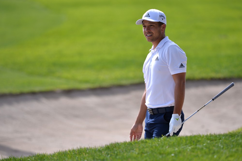 Jan 24, 2019; San Diego, CA, USA; Xander Schauffele watches his shot from a bunker on the sixth hole during the first round of the Farmers Insurance Open golf tournament at Torrey Pines Municipal Golf Course - South Co. Mandatory Credit: Orlando Ramirez-USA TODAY Sports