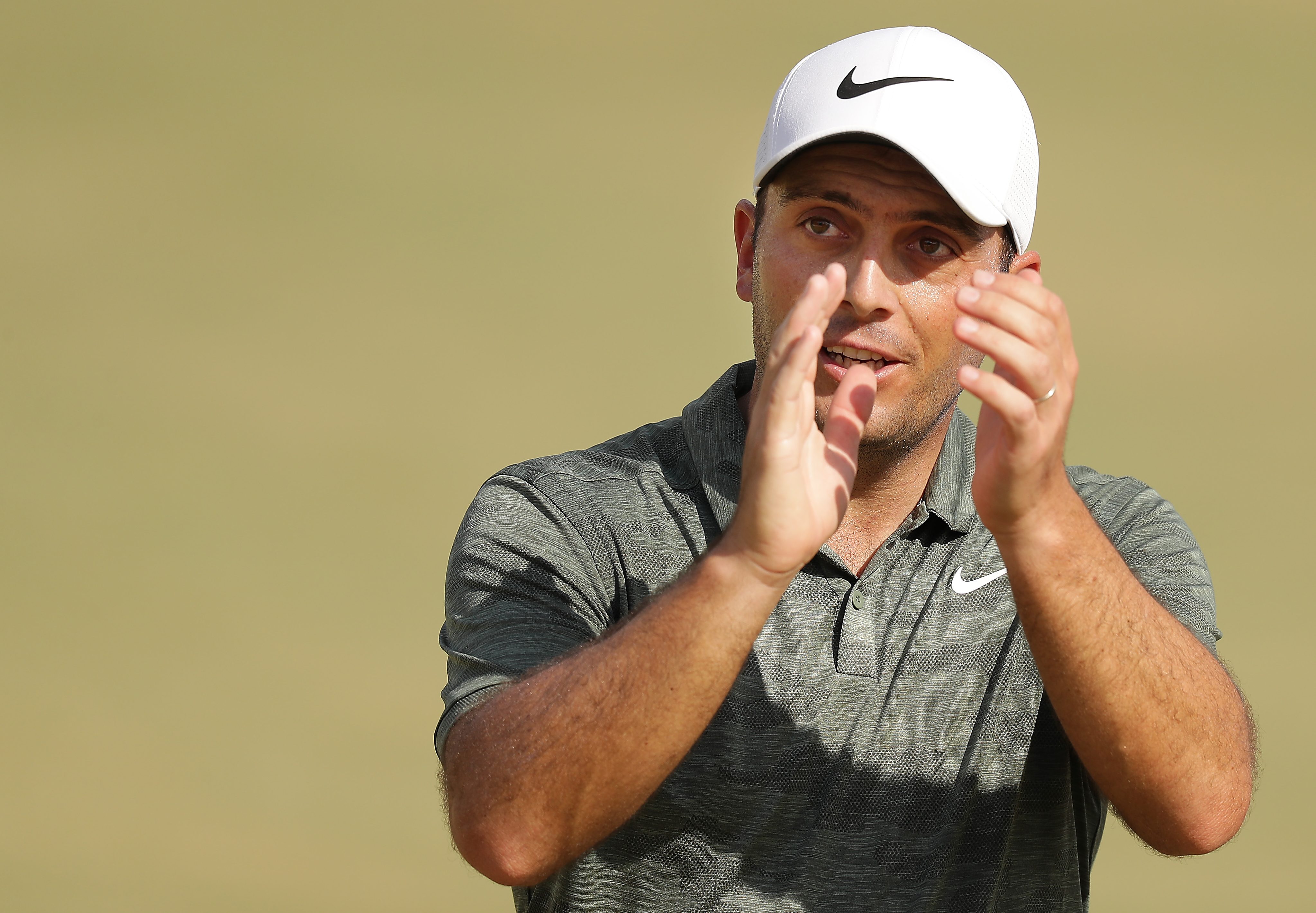 ORLANDO, FLORIDA - MARCH 10: Francesco Molinari of Italy celebrates making a putt for birdie on the 18th hole during the final round of the Arnold Palmer Invitational Presented by Mastercard at the Bay Hill Club on March 10, 2019 in Orlando, Florida. (Photo by Richard Heathcote/Getty Images)