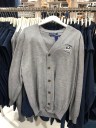 Vineyard Vines’ Jim Nantz Collection is headlined by this Arnold Palmer-inspired Merino wool cardigan, $175 in heather gray only since it is Pebble Beach and grey days do outnumber the sunny ones.