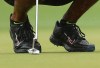 Tiger Woods wearing Nike golf shoes