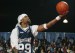 Method Man goes in for a layup over P-Diddy at Rock and Jock in 2002 (Getty)