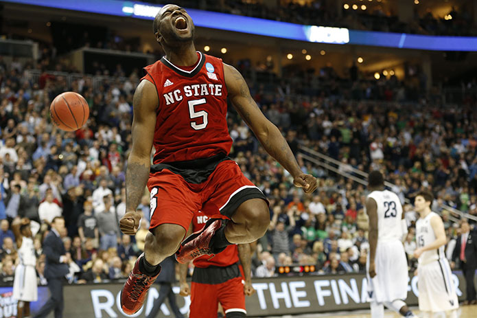 North Carolina State Wolfpack guard Desmond Lee (5) celebrates after defeating the Villanova Wildcats 71-68 in the third round of the 2015 NCAA Tournament at Consol Energy Center. (USA TODAY Sports)