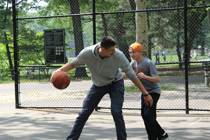 A classic game of 1-on-1 at Central Park. 