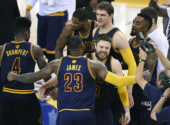 Cleveland Cavaliers forward LeBron James (23) celebrates with guard Matthew Dellavedova (8) the 95-93 victory against the Golden State Warriors in game two of the NBA Finals at Oracle Arena. Mandatory Credit: Bob Donnan-USA TODAY Sports  ORG XMIT: USATSI-225714 ORIG FILE ID:  20150607_gav_sd2_147.jpg