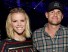 AUSTIN, TX - MAY 02:  Actress Brooklyn Decker (L) and pro tennis player Andy Roddick pose backstage during the 2015 iHeartRadio Country Festival at The Frank Erwin Center on May 2, 2015 in Austin, Texas. The 2015 iHeartRadio Country Festival will be televised as an exclusive nationwide two-hour broadcast special on NBC, May 27 from 9-11 p.m. ET.  (Photo by Rick Diamond/Getty Images for iHeartMedia) ORG XMIT: 551962725 ORIG FILE ID: 472013316