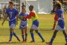 Smith congratulates Eckel after scoring a goal against China (Aaron Mills/Special Olympics USA)