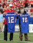 Sep 12, 2013; Ruston, LA, USA; NFL former quarterback Terry Bradshaw (left) and television personality Phil Robertson are honored during a ceremony at Joe Aillet Stadium during a break in the game between the Louisiana Tech Bulldogs and the Tulane Green Wave. Both men played quarterback for Louisiana Tech. Mandatory Credit: Chuck Cook-USA TODAY Sports
