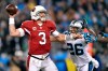 Jan 24, 2016; Charlotte, NC, USA; Arizona Cardinals quarterback Carson Palmer (3) throws a pass against Carolina Panthers defensive back Cortland Finnegan (26) during the first quarter in the NFC Championship football game at Bank of America Stadium. Mandatory Credit: Bob Donnan-USA TODAY Sports