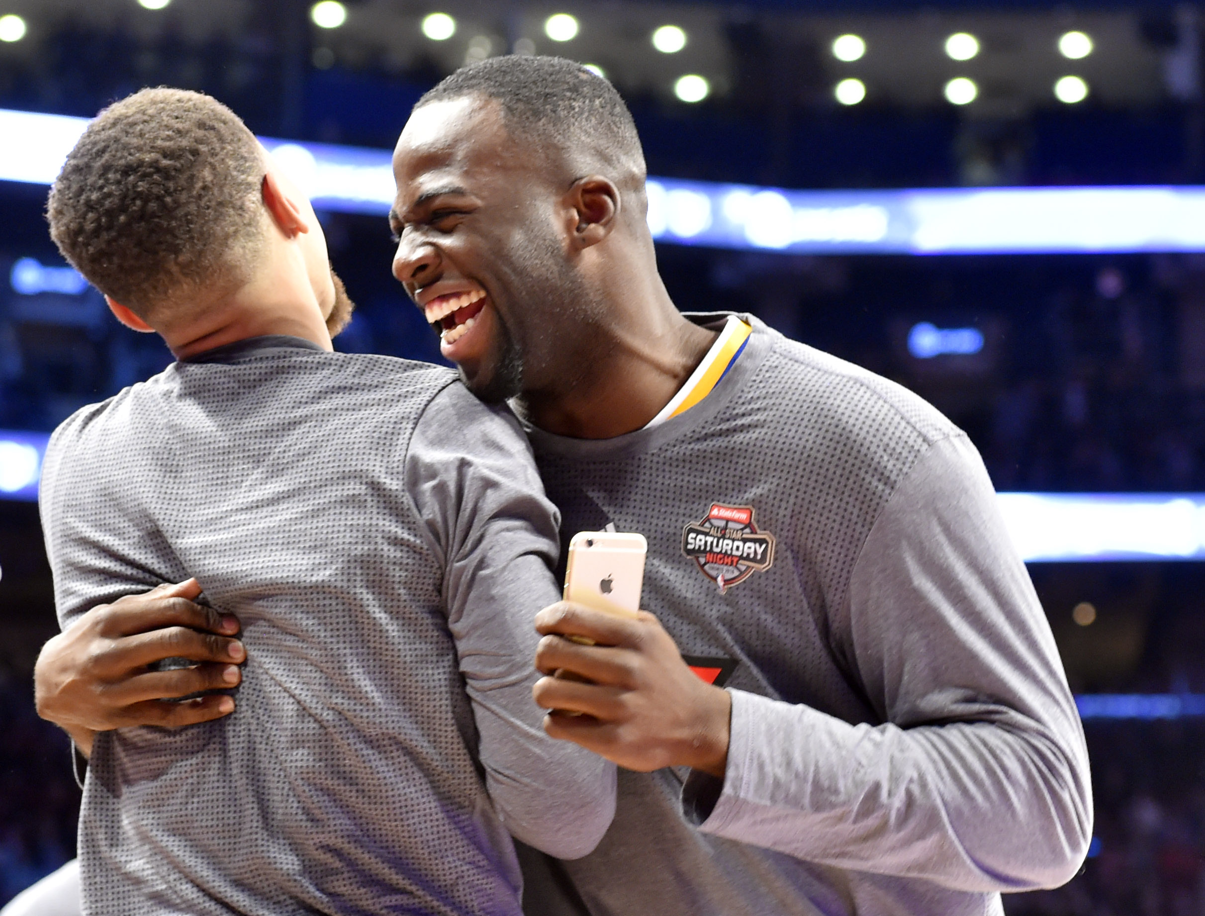 Feb 13, 2016; Toronto, Ontario, Canada; Golden State Warriors forward Draymond Green (right) reacts with teammate Stephen Curry (left) during the skills competition during the NBA All Star Saturday Night at Air Canada Centre. Mandatory Credit: Bob Donnan-USA TODAY Sports