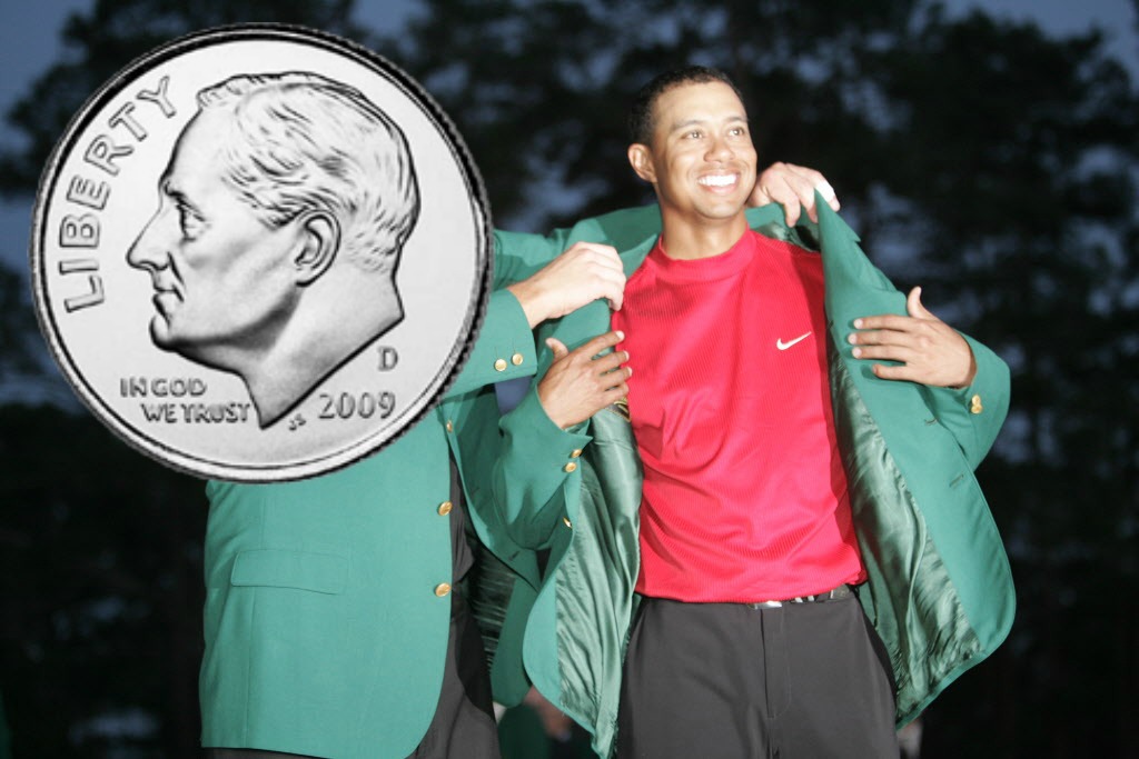 4/10/2005 -- Augusta, GA -- Coverage of The Masters -- Sunday, 4th round. 2004 Masters champion Phil Mickelson helps 2005 winner, Tiger Woods, into his fourth green jacket. Photo by Jack Gruber, USA TODAY staff