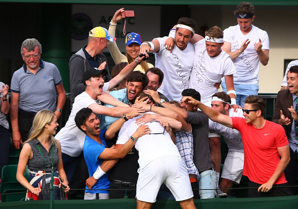 LONDON, ENGLAND - JUNE 27: Marcus Willis of Great Britain celebrates victory with supporters during the Men's Singles first round match against Ricardas Berankis of Lithuania on day one of the Wimbledon Lawn Tennis Championships at the All England Lawn Tennis and Croquet Club on June 27th, 2016 in London, England. (Photo by Jordan Mansfield/Getty Images) ORG XMIT: 596728903 ORIG FILE ID: 543307190