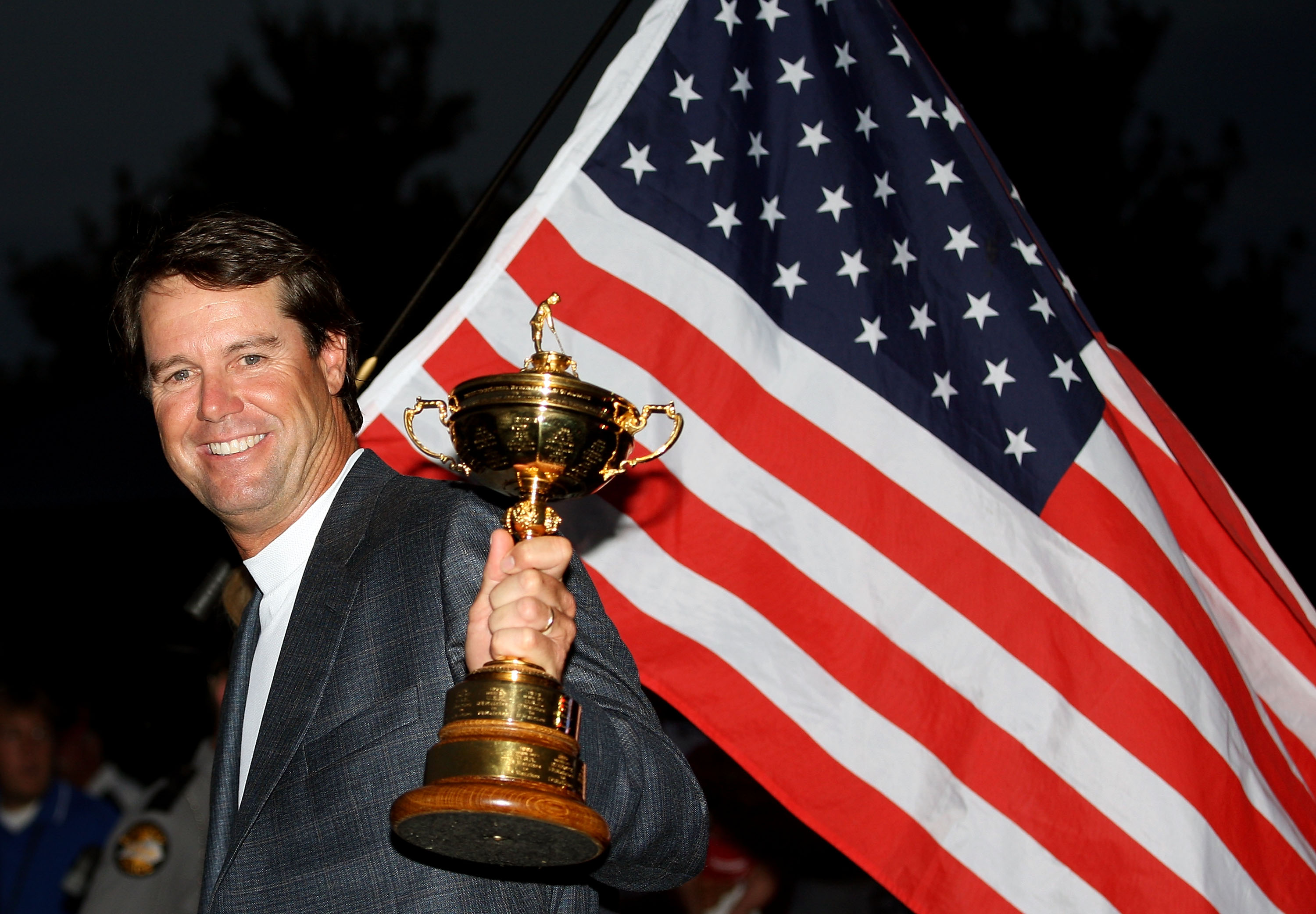 LOUISVILLE, KY - SEPTEMBER 21: USA team captain Paul Azinger celebrates with the Ryder Cup after his team's 16 1/2-11 1/2 victory on the final day of the 2008 Ryder Cup at Valhalla Golf Club on September 21, 2008 in Louisville, Kentucky. (Photo by Ross Kinnaird/Getty Images) ORG XMIT: 82781331 GTY ID: 81331TL008_2008_Ryder_Cu