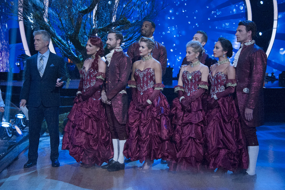 DANCING WITH THE STARS - "Episode 2307" - The eight remaining celebrities will dance to some of the most popular songs throughout the decades, as "Eras Night" comes to "Dancing with the Stars," live, MONDAY, OCTOBER 24 (8:00-10:01 p.m. EDT), on the ABC Television Network. (ABC/Eric McCandless) TOM BERGERON, SHARNA BURGESS, JAMES HINCHCLIFFE, LINDSAY ARNOLD, CALVIN JOHNSON JR., MAUREEN MCCORMICK, ARTEM CHIGVINTSEV, CHERYL BURKE, RYAN LOCHTE