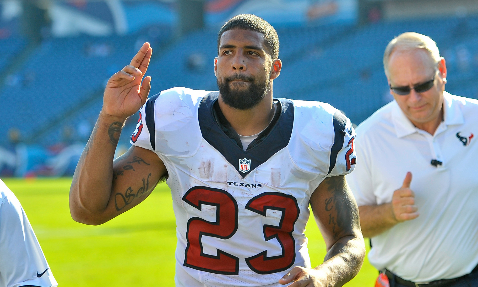 Oct 26, 2014; Nashville, TN, USA; Houston Texans running back Arian Foster (23) signals to fans as he exits the field after the Houston Texans defeated the Tennessee Titans 30-16 at LP Field. Mandatory Credit: Jim Brown-USA TODAY Sports