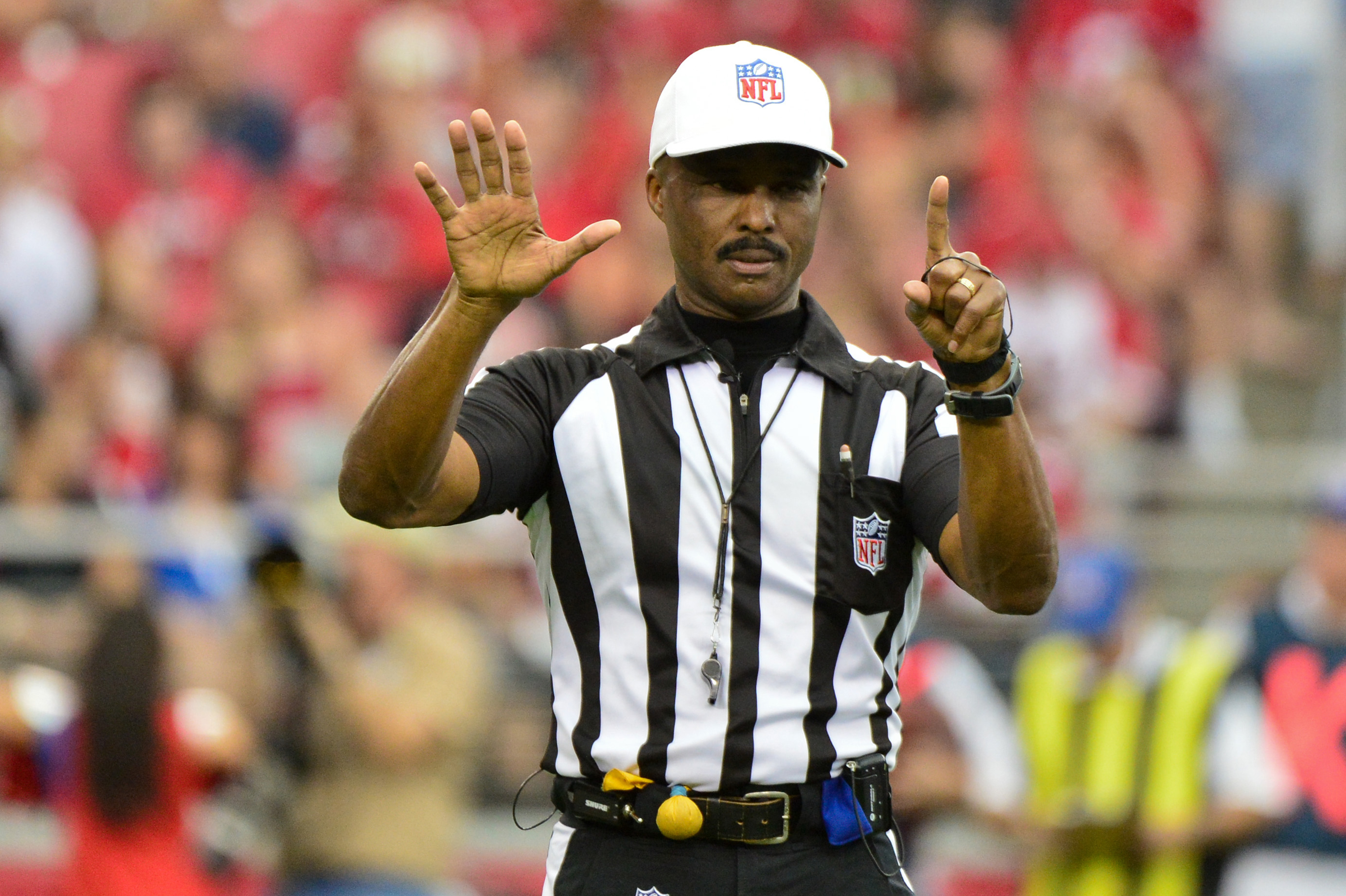 Oct 27, 2013; Phoenix, AZ, USA; NFL referee Mike Carey (94) signals during the first half of the game between the Arizona Cardinals and the Atlanta Falcons at University of Phoenix Stadium. Mandatory Credit: Matt Kartozian-USA TODAY Sports usp ORG XMIT: USATSI-132788 [Via MerlinFTP Drop]